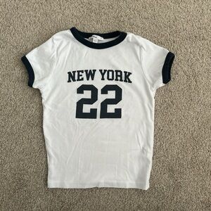 Subdued white and navy baby tee